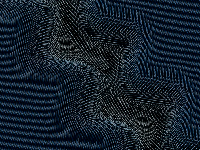 Abstract blue and silver flowing lines on a dark background